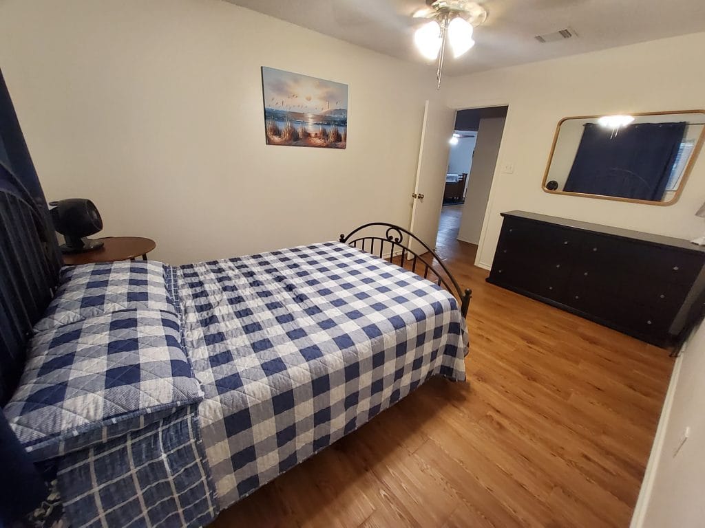 Cozy bedroom featuring a comfortable bed, ample storage, and a clean, inviting atmosphere | Dream TDY