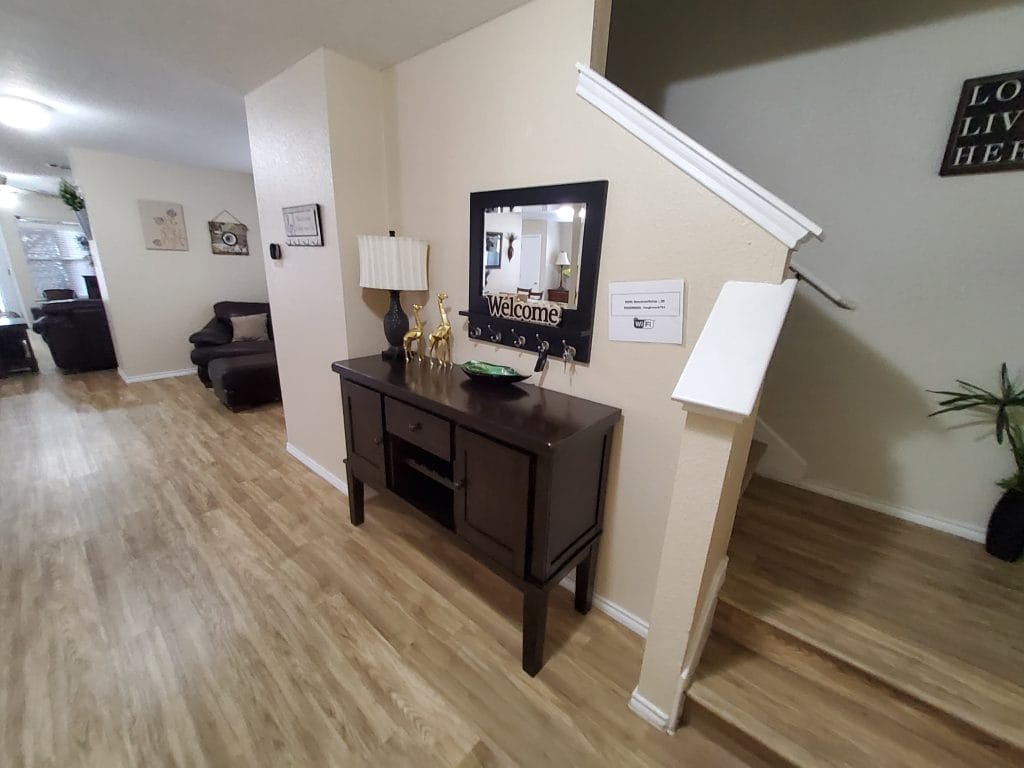 Inviting entryway featuring modern decor and a spacious layout. Ideal for a comfortable military stay | Dream TDY