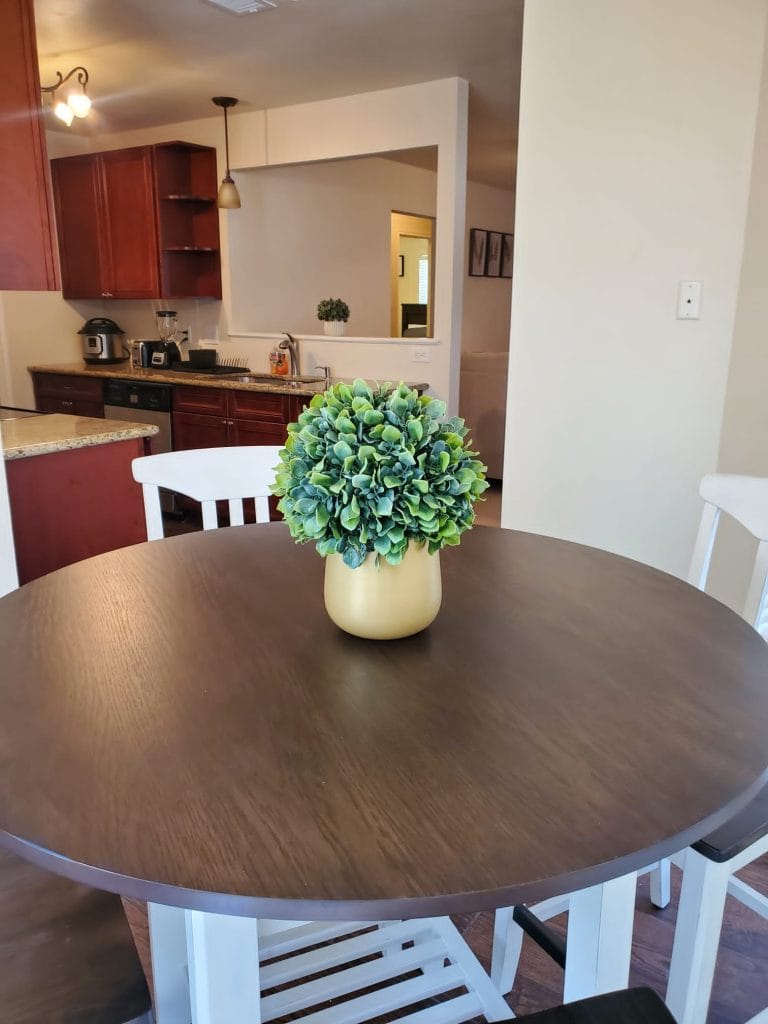 Stylish dining area with modern furniture, clean aesthetics, and open layout, perfect for relaxed meals | Dream TDY