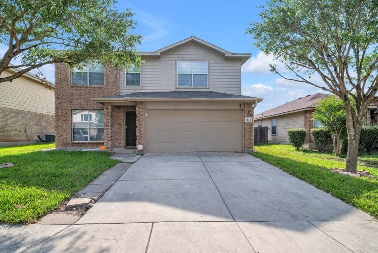 Spacious home with modern curb appeal, lush grass, and inviting entry. Perfect for short-term military rentals | Dream TDY