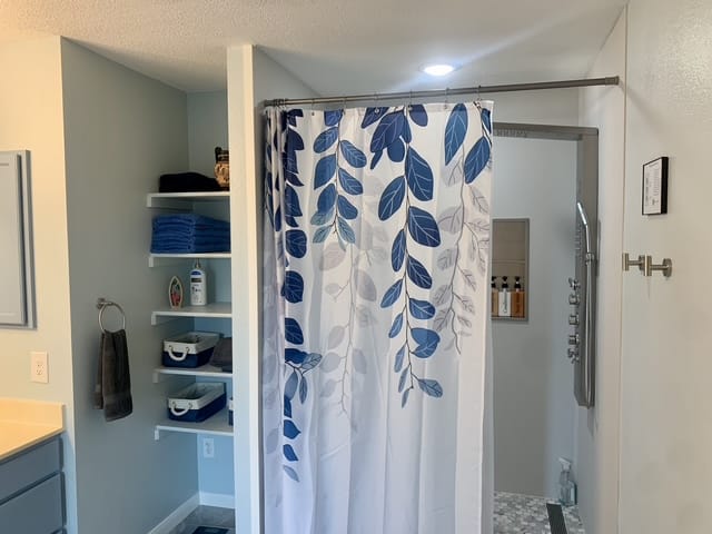 Bright, clean bathroom featuring modern fixtures, ample storage, and a serene vibe perfect for relaxation | Dream TDY