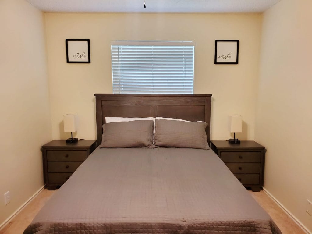 Cozy bedroom with modern furnishings, clean aesthetics, and soft lighting; perfect for relaxation after a busy day | Dream TDY