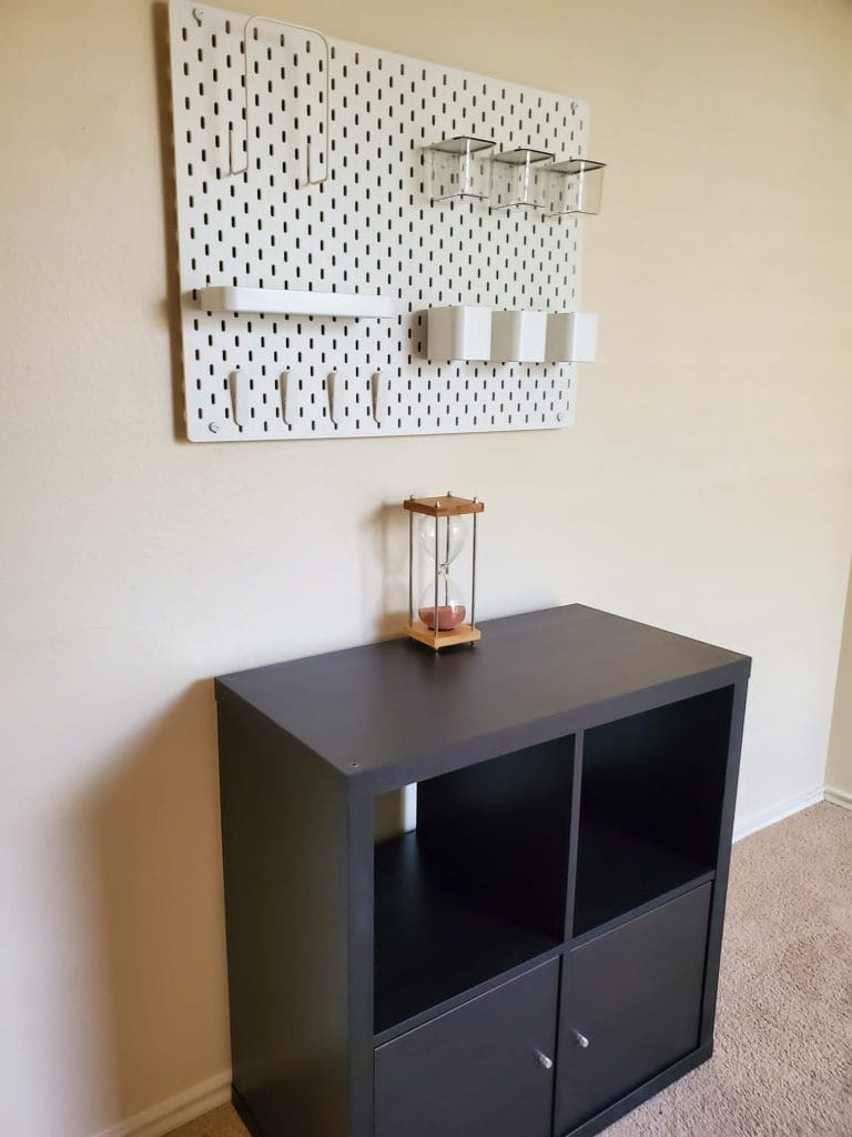 Stylish workspace features minimalist shelving and organized storage, perfect for military personnel. Clean and modern vibe | Dream TDY