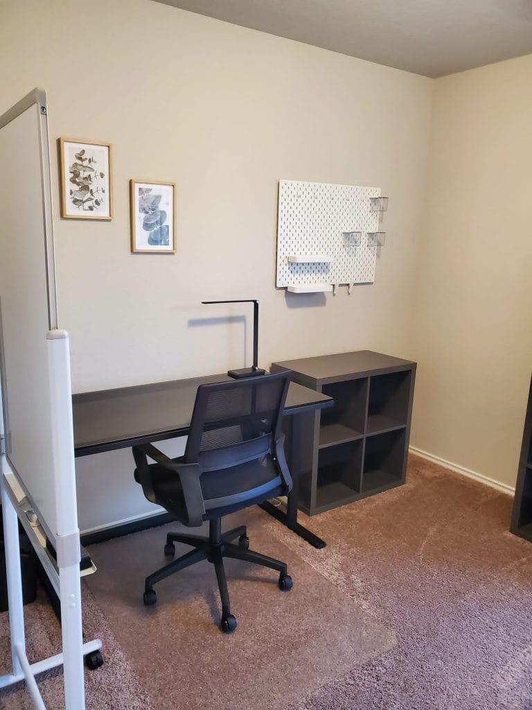 Bright and organized workspace featuring a modern desk, ergonomic chair, and practical storage solutions | Dream TDY