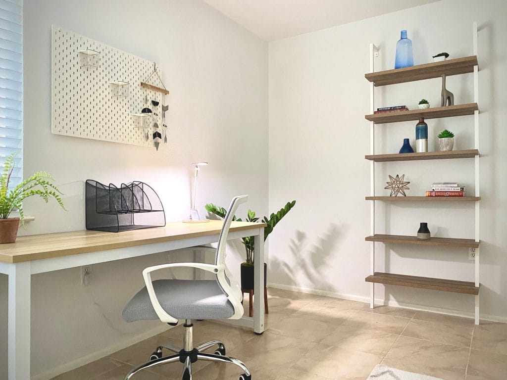 Bright, inviting workspace with modern desk and ergonomic chair; stylish decor and ample natural light enhance productivity | Dream TDY