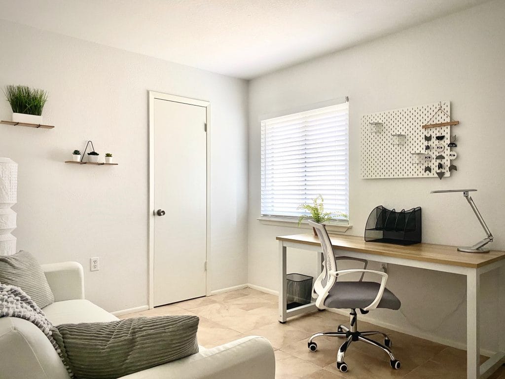 Bright and airy workspace featuring modern furniture, a sleek desk, and cozy seating; ideal for productivity and relaxation | Dream TDY