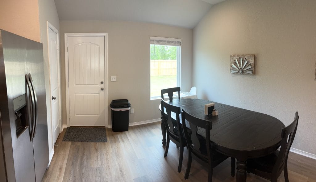 Bright and inviting dining space features modern appliances, spacious seating, and a clean design, perfect for relaxation | Dream TDY