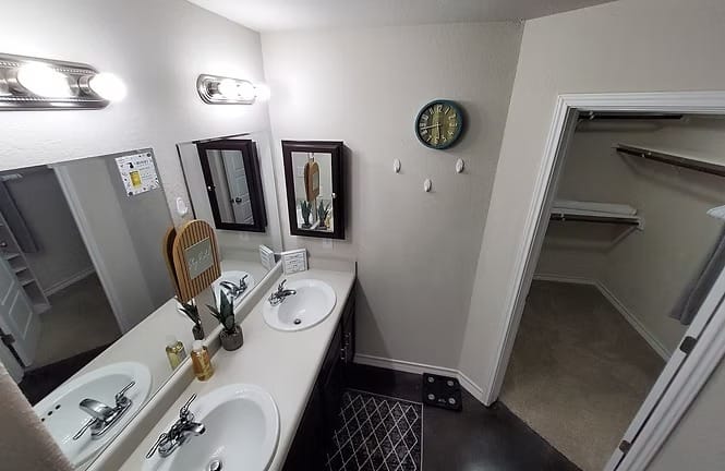 Stylish bathroom with dual sinks, ample storage, and modern fixtures. Spacious layout ensures comfort and convenience | Dream TDY