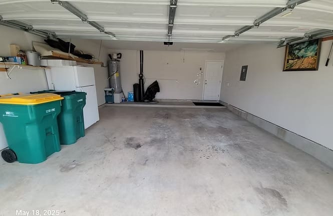 Spacious garage with ample storage, modern appliances, and easy access. Perfect for vehicles or extra equipment | Dream TDY