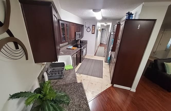 Inviting kitchen with modern appliances, ample counter space, and clean cabinetry. Perfect for meal prep | Dream TDY