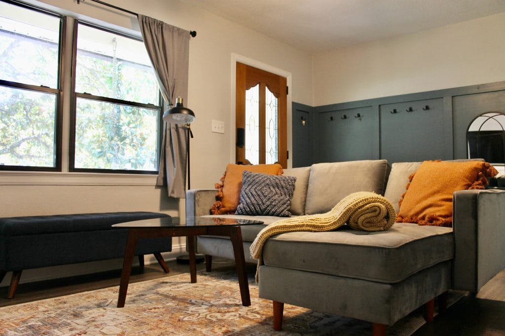 Cozy living area with stylish furniture, bright windows, modern decor, dedicated workspace, and inviting ambiance | Dream TDY