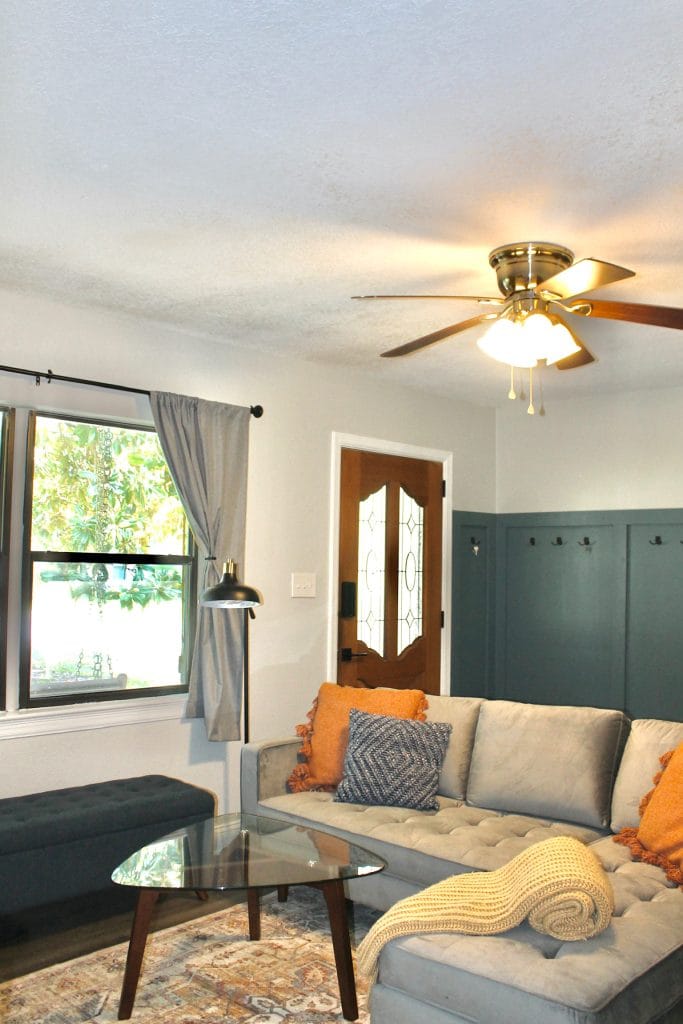 Bright, cozy living area with stylish furniture, clean decor, and a dedicated workspace | Dream TDY